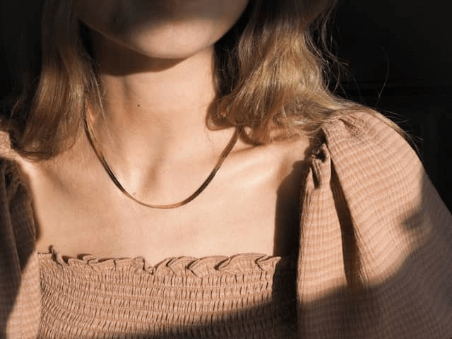 Girl wearing print on demand necklace